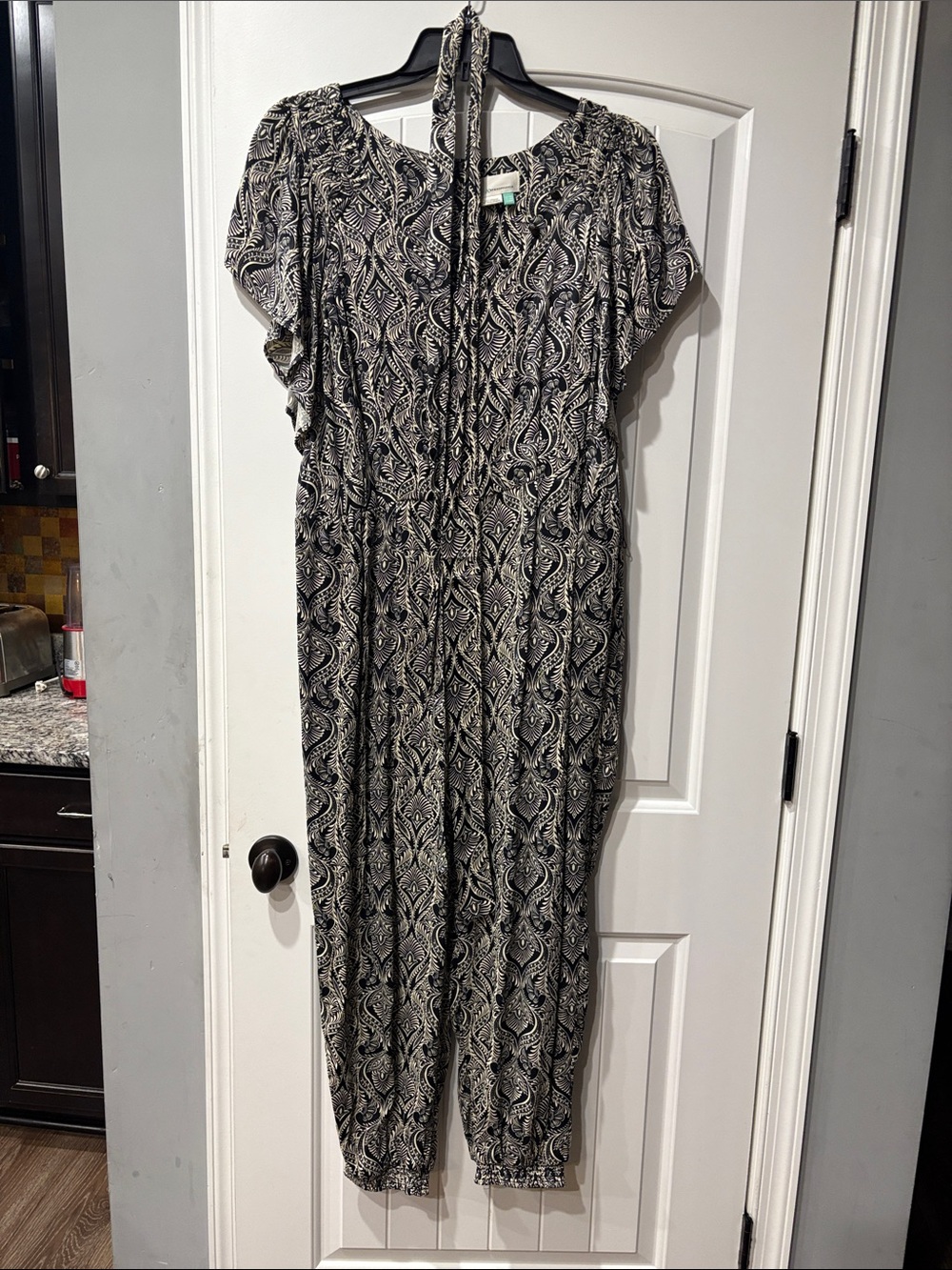Anthropologie silky soft Black and Cream jumpsuit button front soft belt